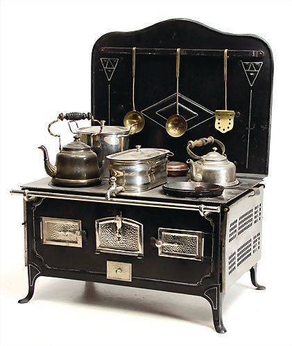 30-pretend-kitchens-we-kind-of-wish-were-real-kid-kitchens-traditional-black-kitchen-for-kids-578850f181c866970ee812c5-w620_h800